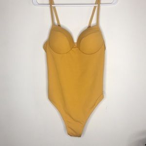Yellow cheeky one piece bathing suit